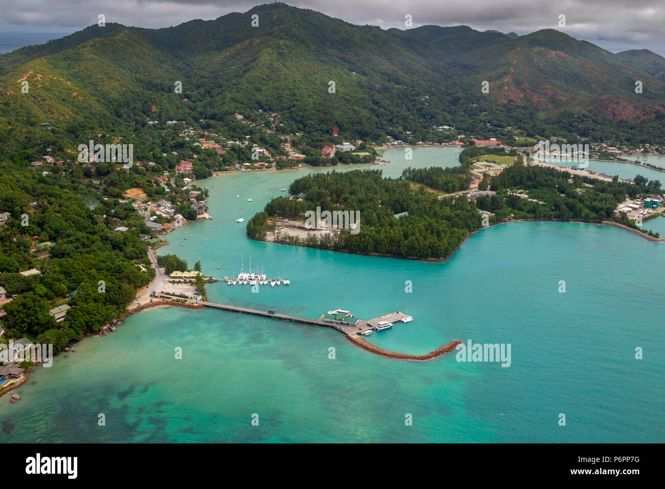Aerial view of Baie Sainte Anne and the harbour of Praslin, Seychelles in the Indian Ocean. Stock Photo