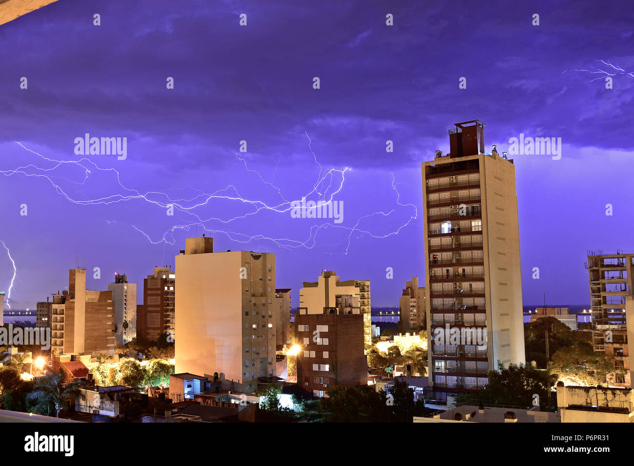 Electrical storm with lots of thunders bolts and lightnings in my neighborhood Stock Photo