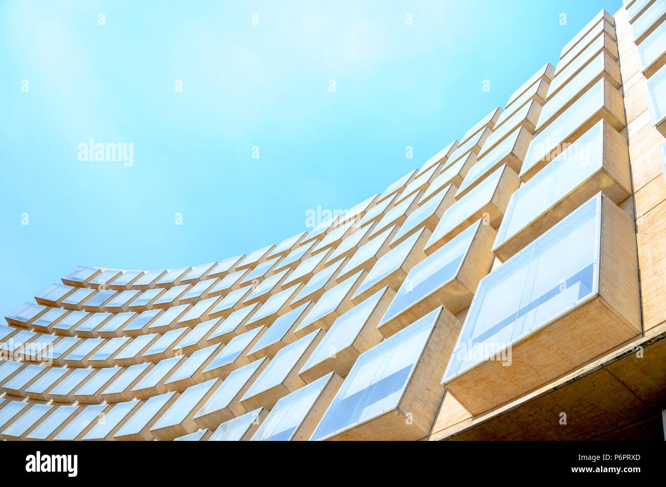 Modern office building exterior with blue sky Stock Photo - Alamy