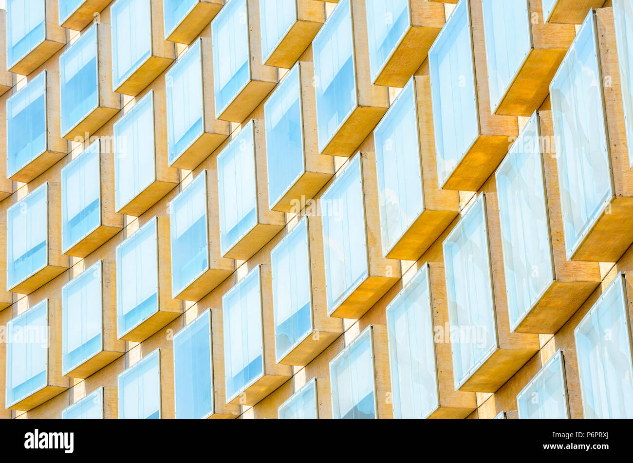 Modern office building exterior with blue sky reflected Stock Photo - Alamy