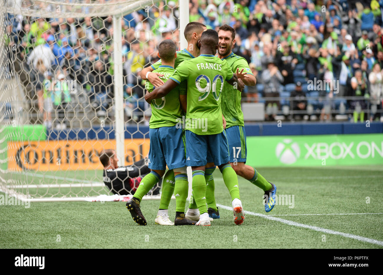 Seattle, Washington, USA. 30th June, 2018. The Sounders VICTOR RODRIGUEZ (8) celebrates his first goal of the season with WILL BRUIN (17), CLINT DEMPSEY (2) and WAYLON FRANCIS (90) as the Portland Timbers play the Seattle Sounders in a Western Conference match at Century Link Field in Seattle, WA. Credit: Jeff Halstead/ZUMA Wire/Alamy Live News Stock Photo