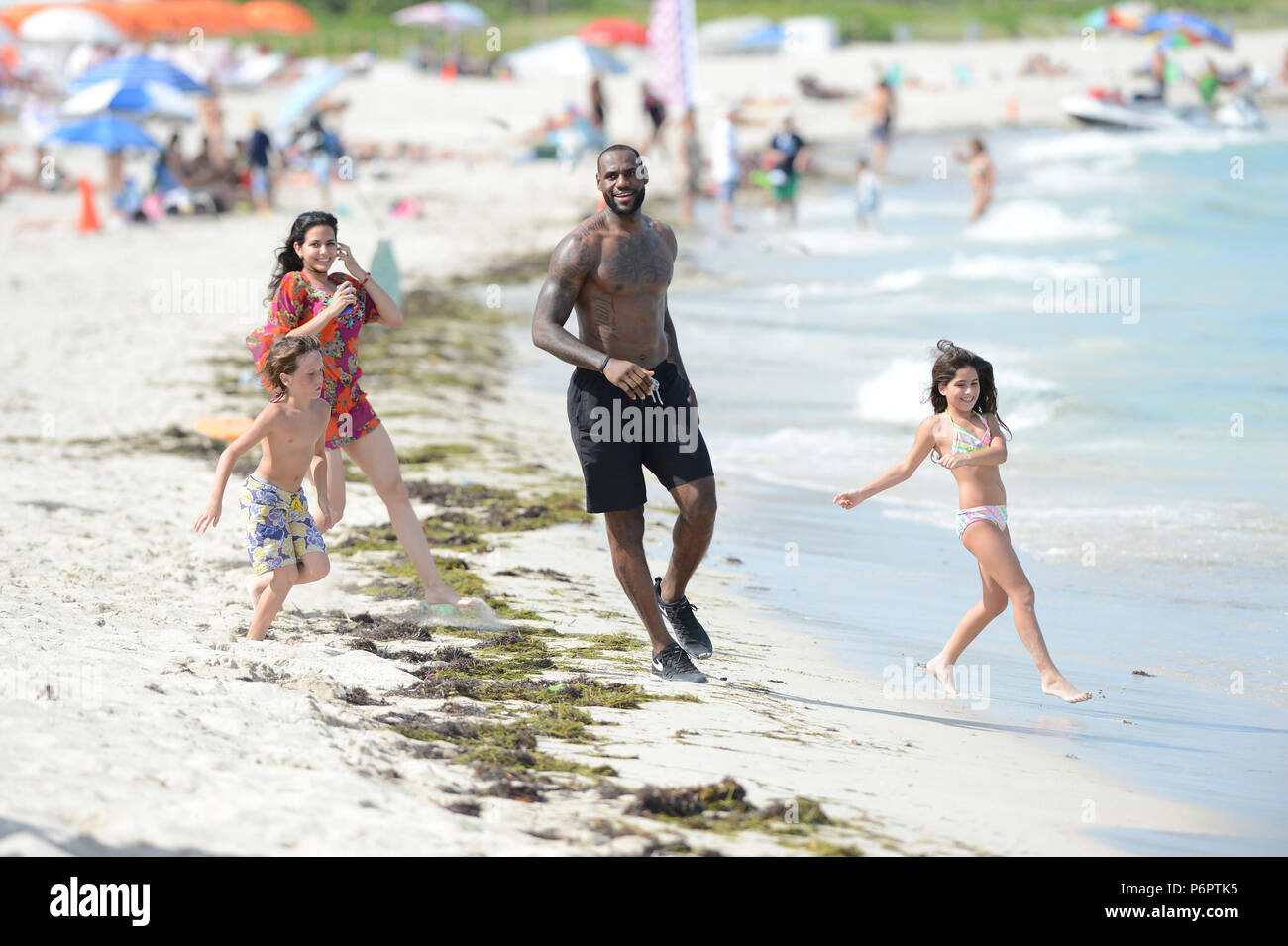 MIAMI BEACH, FL - AUGUST 16: LeBron James showed up on location in Miami  Beach for a Nike commercial. The NBA champion hopped on a bicycle and rode  around the iconic Ocean