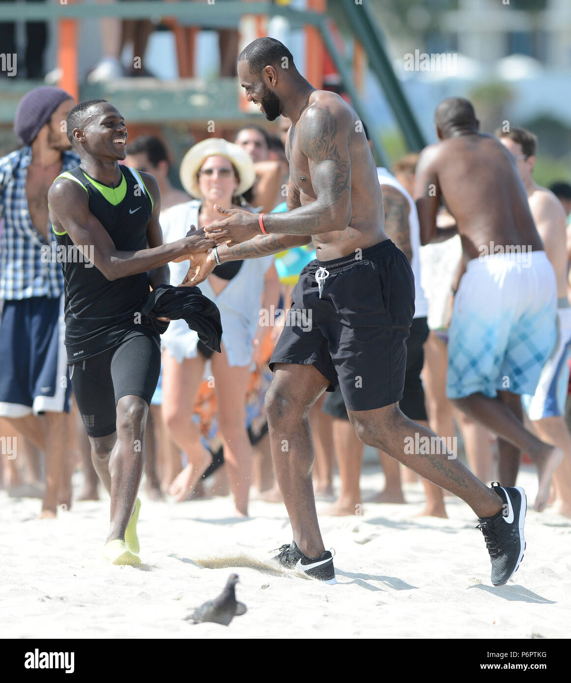 MIAMI BEACH, FL - AUGUST 16: LeBron James showed up on location in Miami  Beach for a Nike commercial. The NBA champion hopped on a bicycle and rode  around the iconic Ocean