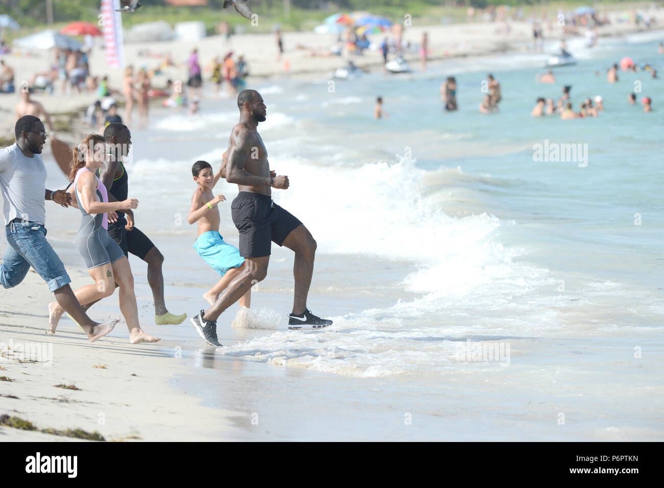 MIAMI BEACH, FL - AUGUST 16: LeBron James showed up on location in Miami  Beach for a Nike commercial. The NBA champion hopped on a bicycle and rode  around the iconic Ocean