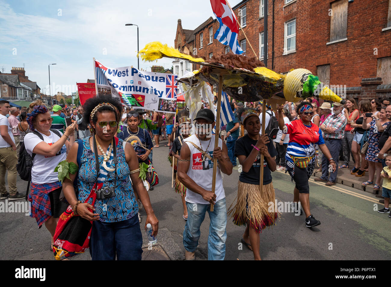 Oxford, UK. 1st July 2018. The annual Cowley Road Carnival was estimated to have drawn in 50,000 revellers to East Oxford. The hot and sunny day reached 28 degrees. This years parade theme was based upon Ôicons of artÕ. The carnival was organised by charity Cowley Road Works. Credit: Stephen Bell/Alamy Live News. Stock Photo