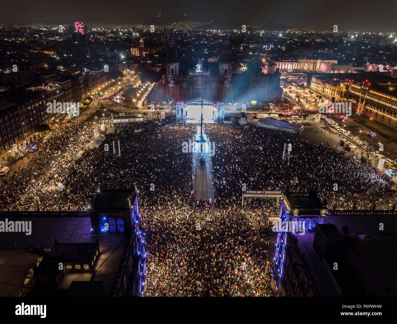 Mexico City. 2nd July, 2018. Photo taken on July 2, 2018 with a drone shows supporters of Mexico's presidential candidate for the coalition 'Together We Will Make History' Andres Manuel Lopez Obrador celebrating at Zocalo Square, in Mexico City, capital of Mexico. Leftist candidate Andres Manuel Lopez Obrador has topped his rivals with 43.93 percent of votes, early result for the presidential elections in Mexico showed Sunday night. Credit: Cesar Vicuna/Xinhua/Alamy Live News Stock Photo