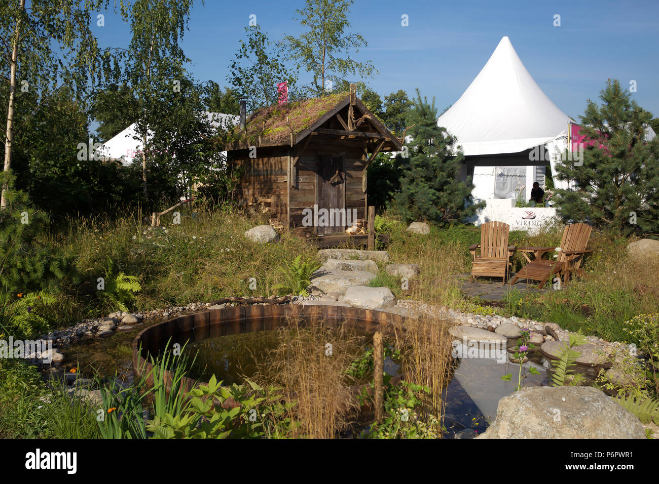 East Molesey, UK. 2nd July, 2018. The Viking Cruises Nordic Lifestyle Garden. Press Day takes place at the RHS Hampton Court Palace Flower Show which runs from the 2nd-8th July 2018. It is the largest flower show in the world covering over 34 acres with the centre piece being the long walk. There are various gardens to admire and gain ideas from along with plant, flower stalls and various other garden features. Credit: Keith Larby/Alamy Live News Stock Photo