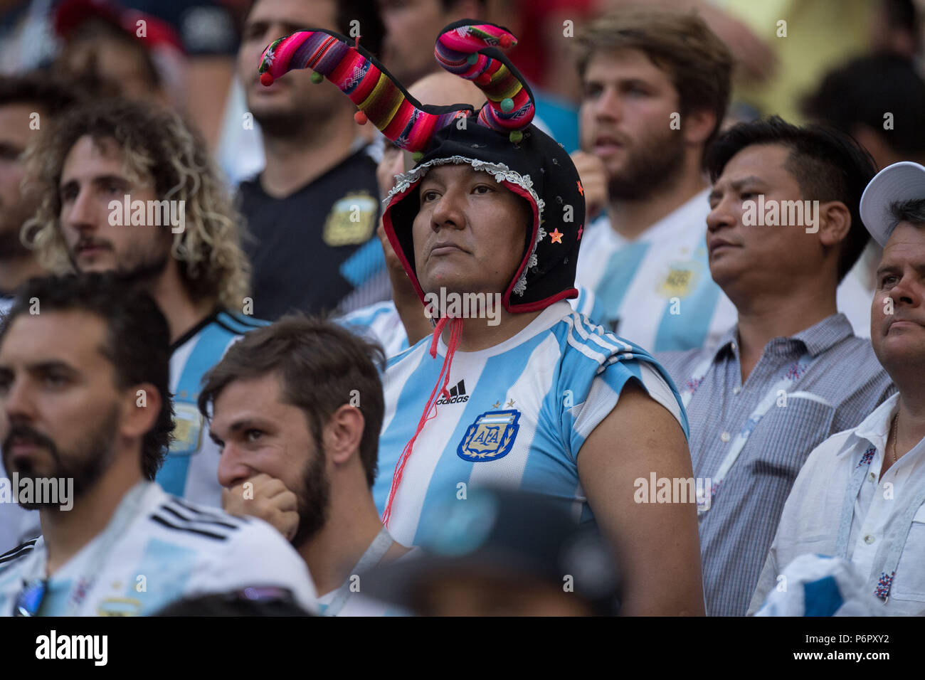 Kazan, Russland. 30th June, 2018. Argentine fans are frustrated after the game, frustrated, frozen lateet, disappointed, showered, decapitation, disappointment, sad, fan, fans, spectators, supporters, supporters, bust image, France (FRA) - Argentina (ARG) 4: 3, knockout round, match 50, on 30.06.2018 in Kazan; Football World Cup 2018 in Russia from 14.06. - 15.07.2018. | usage worldwide Credit: dpa/Alamy Live News Stock Photo