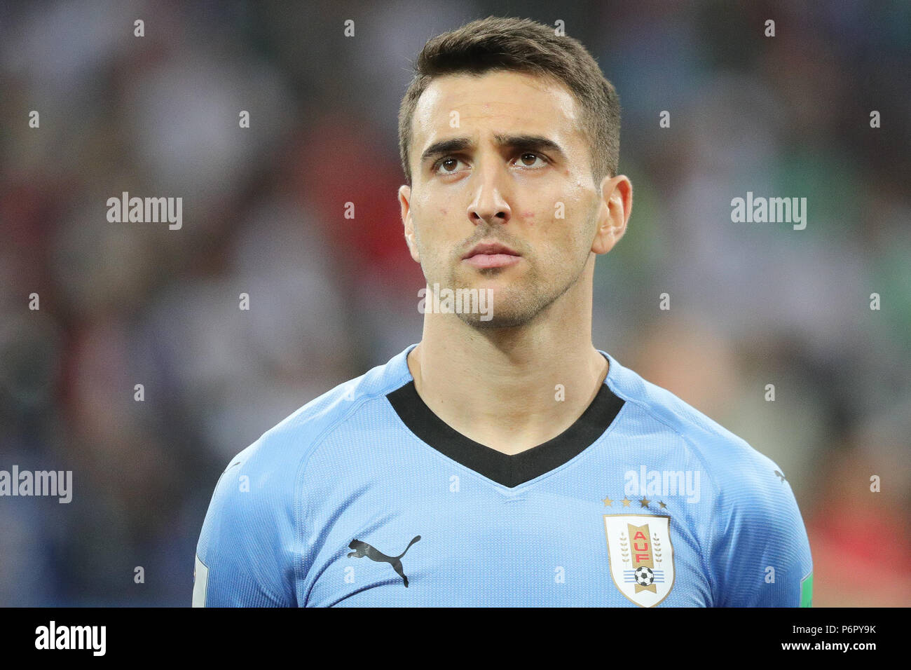 Sochi, Russia. 30th June, 2018. Soccer, World Cup 2018, Round of 16, Uruguay vs. Portugal at the Sochi stadium. Uruguay's Maxi Pereira standing for the national anthem before the game. Credit: Christian Charisius/dpa/Alamy Live News Stock Photo