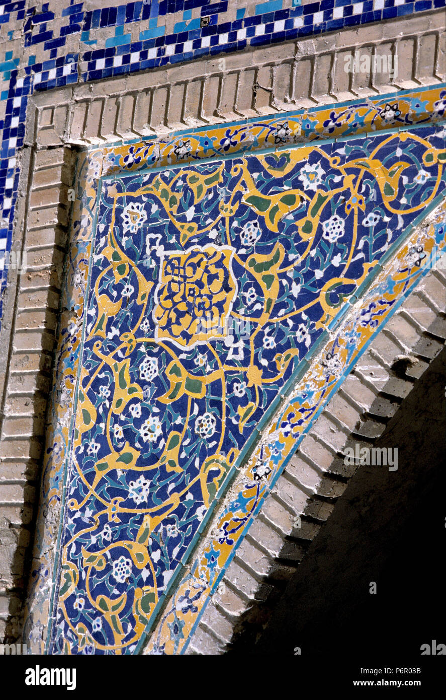 Detail of a madrasah goal arch decorated with faience and mosaics in Bukhara, undated photograph from October 1992. The historical, mostly Islamic center of Bukhara was declared a UNESCO World Heritage Site in 1993, and the state of Uzbekistan gained its independence after the collapse of the Soviet Union on 01.09.1991. Photo: Matthias Toedt / dpa central image / ZB / picture alliance | usage worldwide Stock Photo