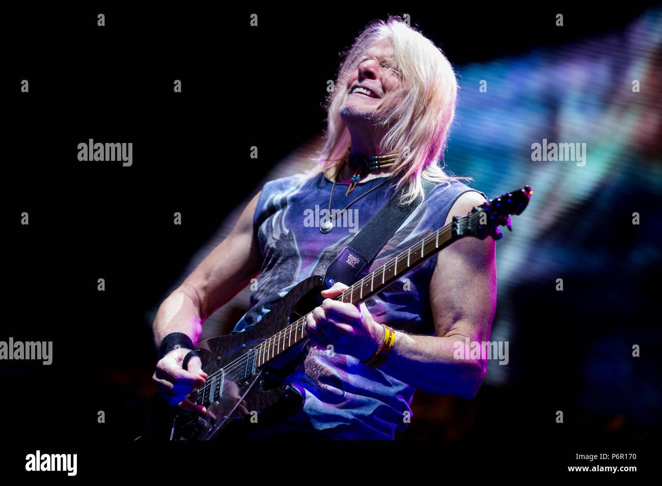 Deep Purple guitar player, Steve Morse performs. Deep purple band performs at Tauron Arena Krakow as part of the farewell tour, The Long Goodbye Tour. Stock Photo