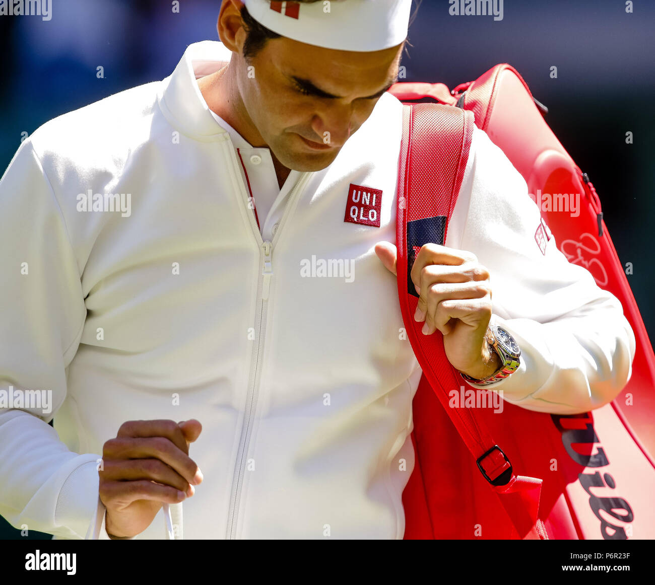 London, UK, 2nd July 2018: Roger Federer of Switzerland wears japanese  brand clothing from his new outfitter Uniqlo during Day 1 at the Wimbledon  Tennis Championships 2018 at the All England Lawn