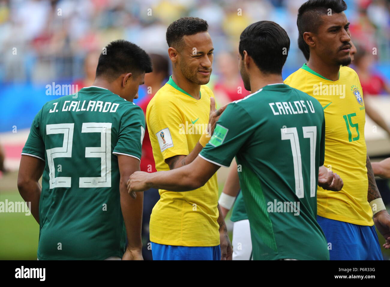Samara, Russia. 02nd July, 2018. Soccer, World Cup 2018, Final Round- Round of 16: Mexico vs. Brazil at the Samara Stadium: Brazil's Neymar (2nd from the left) and Paulinho f(r) welcome Mexico's Jesus Gallardo (l) and Carlos Vela (r) before the game. Credit: Christian Charisius/dpa/Alamy Live News Stock Photo