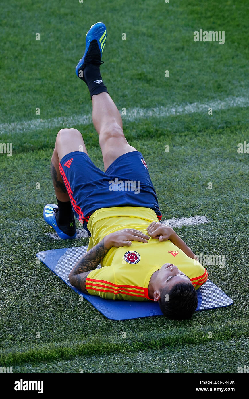 Moscow, Russia. 2nd July 2018. James Rodriguez of Colombia sits out and stretches during a Colombia training session, prior to their 2018 FIFA World Cup Round of 16 match against England, at Spartak Stadium on July 2nd 2018 in Moscow, Russia. Credit: PHC Images/Alamy Live News Stock Photo