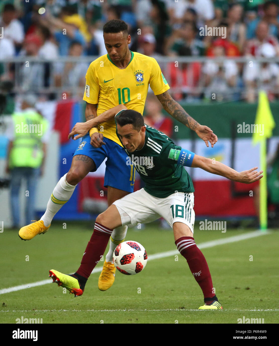 Samara, Russia. 2nd July, 2018. Neymar (top) of Brazil vies with Andres Guardado of Mexico during the 2018 FIFA World Cup round of 16 match between Brazil and Mexico in Samara, Russia, July 2, 2018. Brazil won 2-0 and advanced to the quarter-final. Credit: Li Ming/Xinhua/Alamy Live News Stock Photo