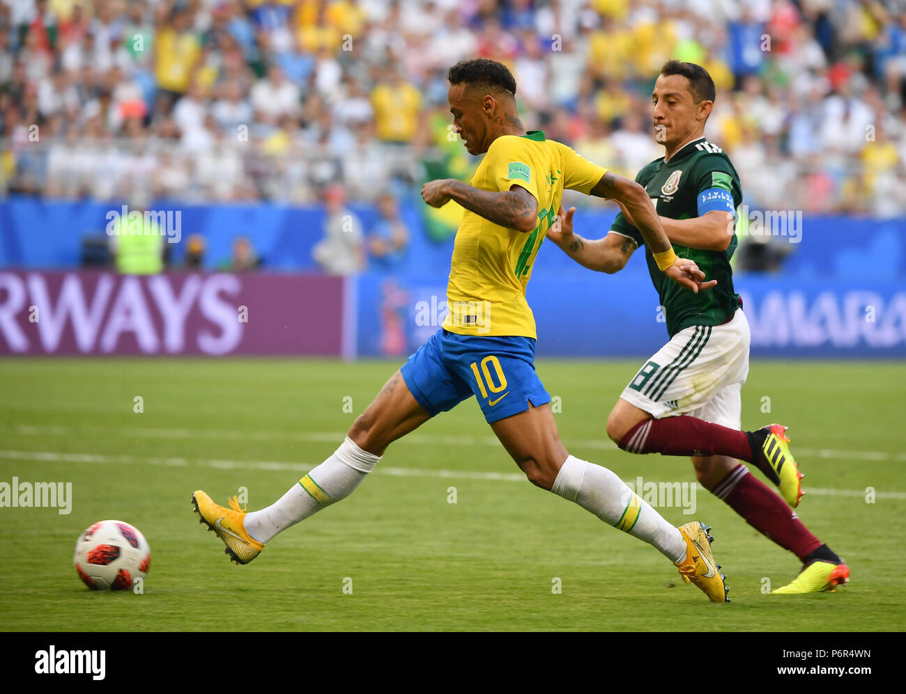 Samara, Russia. 2nd July, 2018. Neymar (L) of Brazil vies with Andres Guardado of Mexico during the 2018 FIFA World Cup round of 16 match between Brazil and Mexico in Samara, Russia, July 2, 2018. Brazil won 2-0 and advanced to the quarter-final. Credit: Li Ga/Xinhua/Alamy Live News Stock Photo