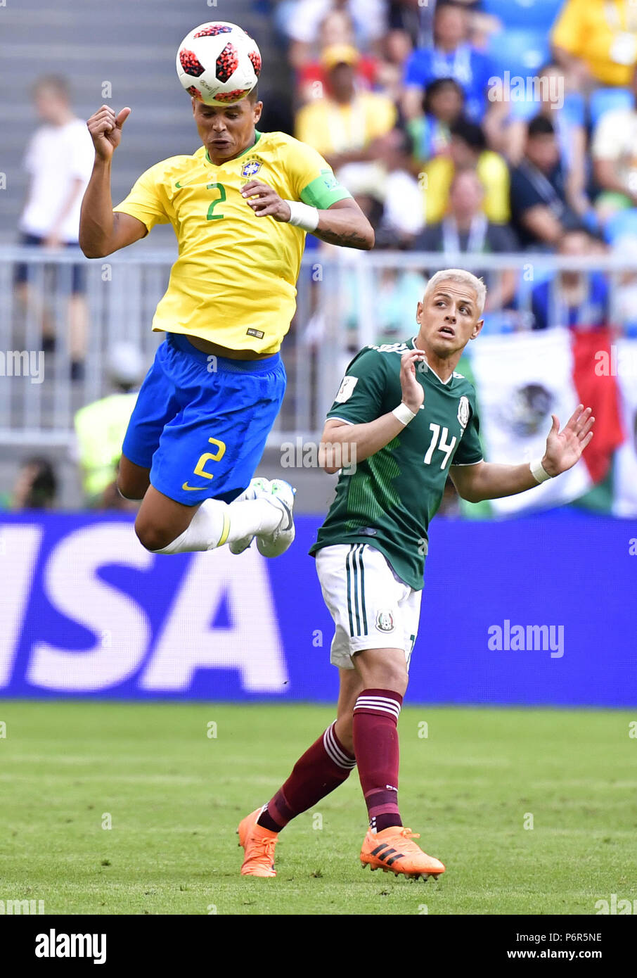 Samara, Russia. 2nd July, 2018. Thiago Silva (L) of Brazil vies with Javier Hernandez of Mexico during the 2018 FIFA World Cup round of 16 match between Brazil and Mexico in Samara, Russia, July 2, 2018. Brazil won 2-0 and advanced to the quarter-final. Credit: Chen Yichen/Xinhua/Alamy Live News Stock Photo