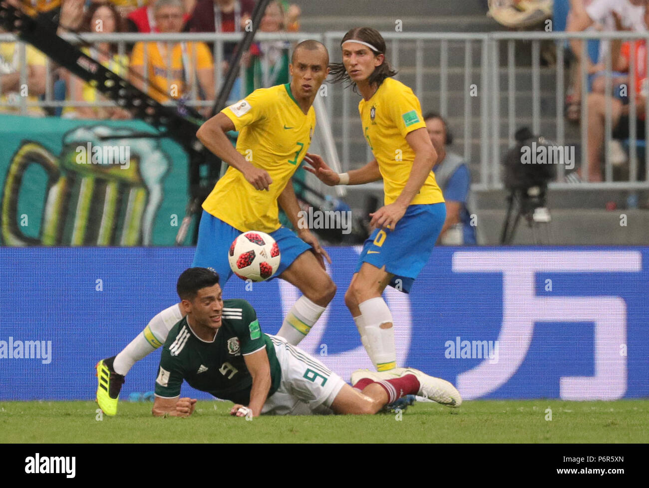 Samara, Russia. 02nd July, 2018. Soccer, World Cup 2018, Final round - round of 16: Mexico vs. Brazil at the Samara stadium: Brazil's Miranda (top L) and Mexico's Raul Jimenez (bottom) vying for the ball. Credit: Christian Charisius/dpa/Alamy Live News Stock Photo