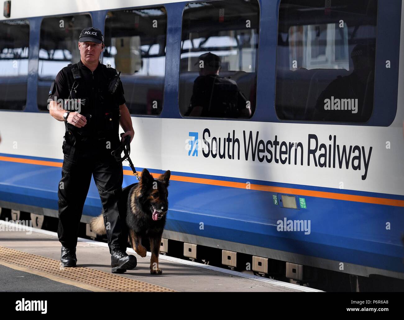 Weymouth, Dorset, UK. 2nd July 2018. A man seen 'in possession of a knife' on a train at Weymouth station. Credit: Finnbarr Webster/Alamy Live News Stock Photo