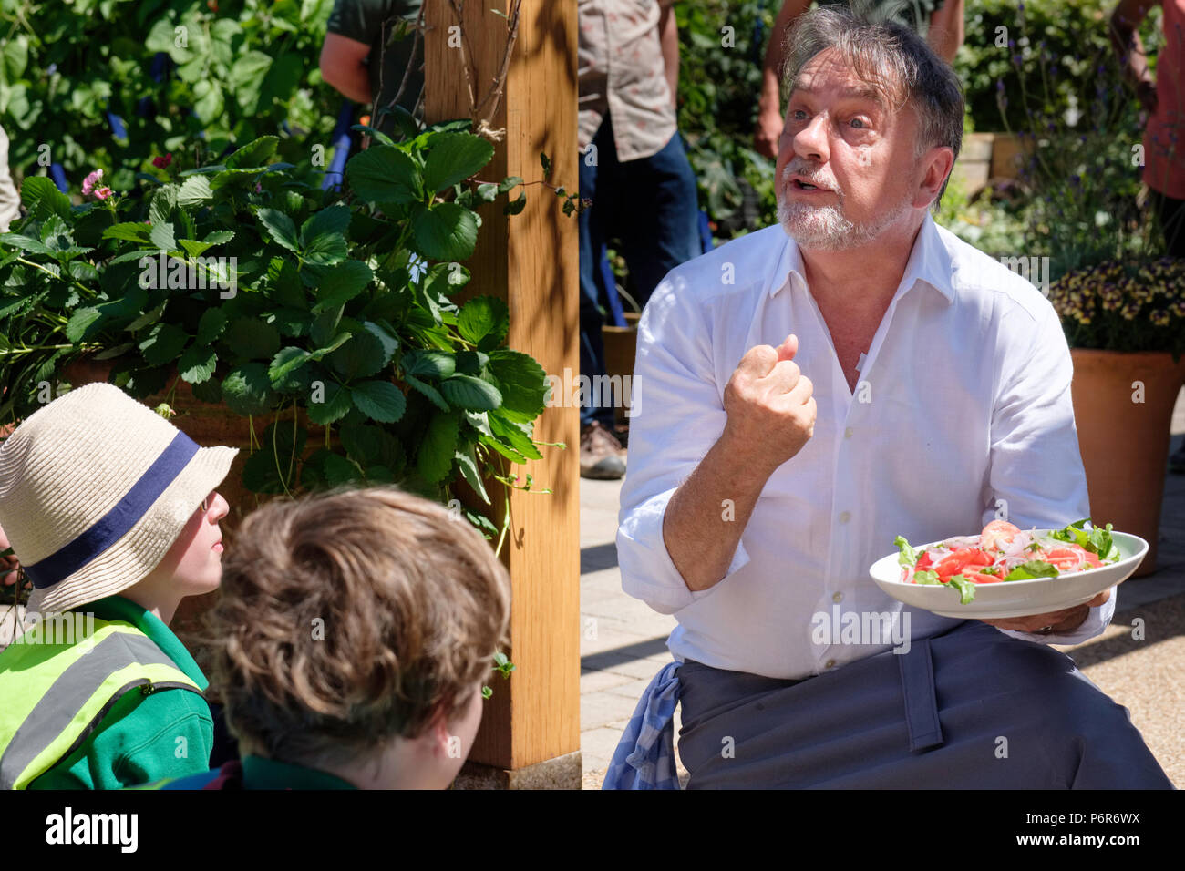 RHS Hampton Court Palace Flower Show, July 2, 2018. Raymond Blanc owner and chef of Le Manoir aux Quat' Saisons teaching children about food. Credit P Tomlins/Alamy Live News Stock Photo