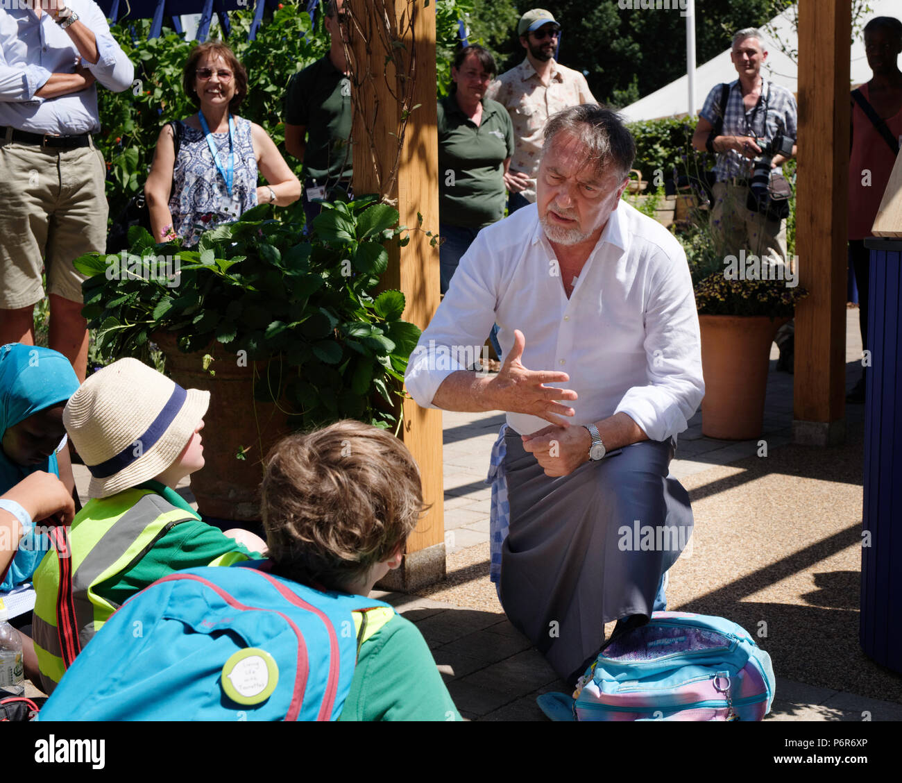 RHS Hampton Court Palace Flower Show, July 2, 2018. Raymond Blanc owner and chef of Le Manoir aux Quat' Saisons teaching children about food. Credit P Tomlins/Alamy Live News Stock Photo
