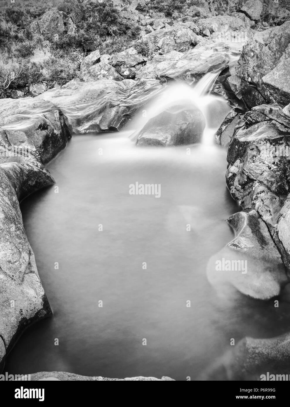 Multiple waterfalls on River Brittle  with many cold swimmable pools. Black and white photography Stock Photo