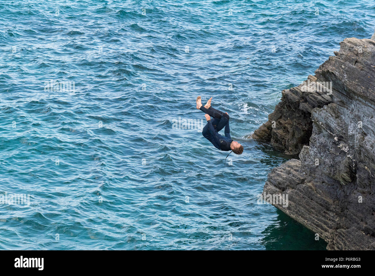 The dangerous craze of tombstoning off rocks at Newquay in Cornwall. Stock Photo