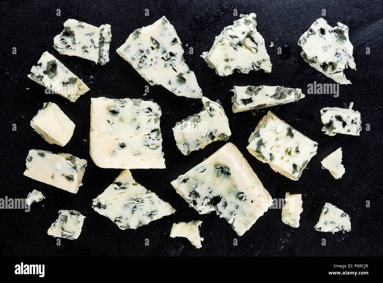 Danish blue cheese on dark background. Top view Stock Photo