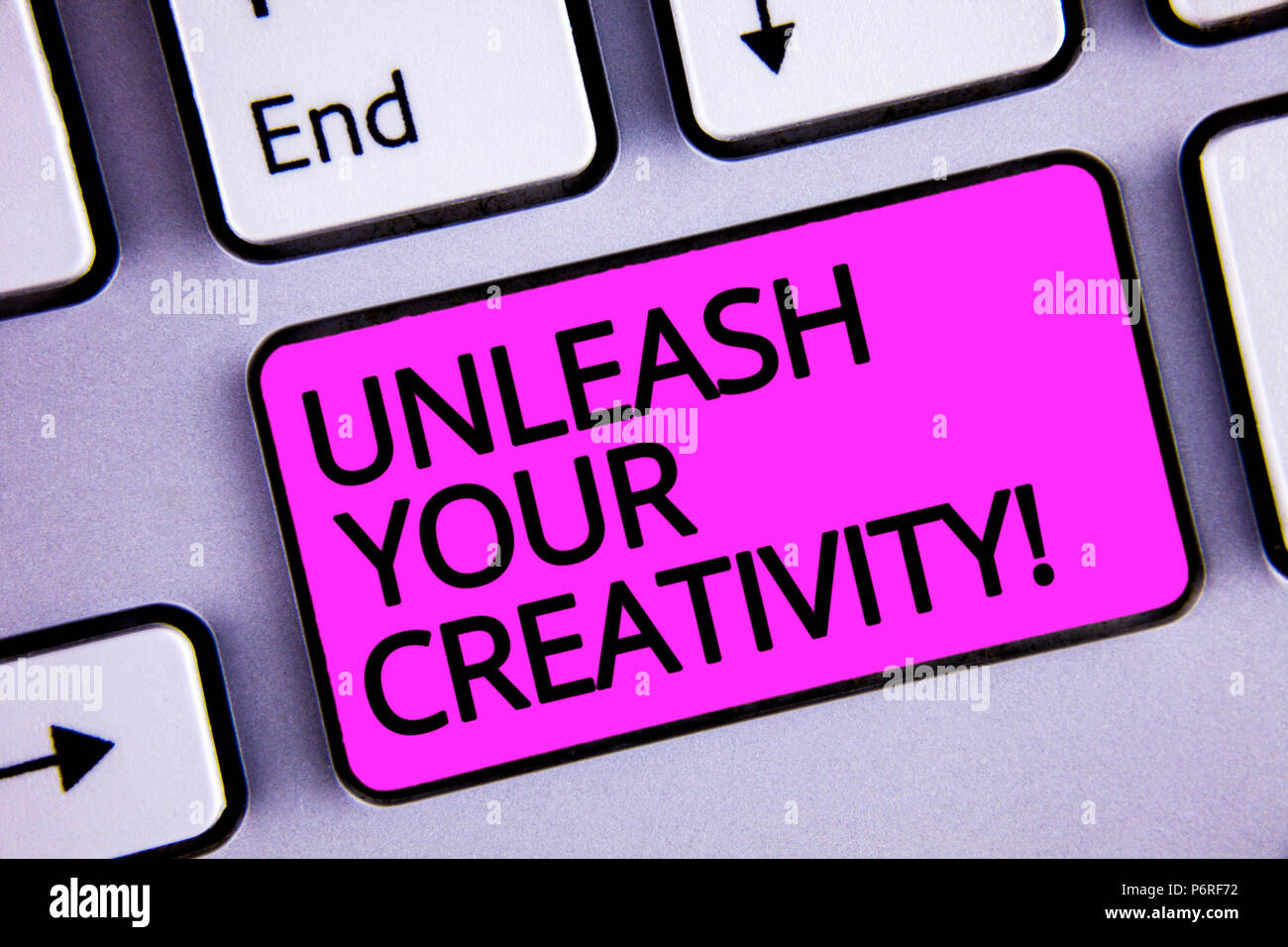 Handwriting text Unleash Your Creativity Call. Concept meaning Develop Personal Intelligence Wittiness Wisdom Keyboard purple key Intention create tex Stock Photo