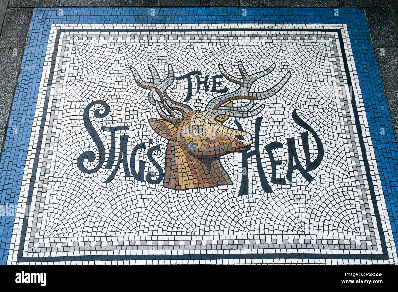 The Stag's Head pub entrance mosaic from the perfectly preserved traditional Victorian Pub of the same name, Dame Street, Dublin, Ireland, Europe. Stock Photo