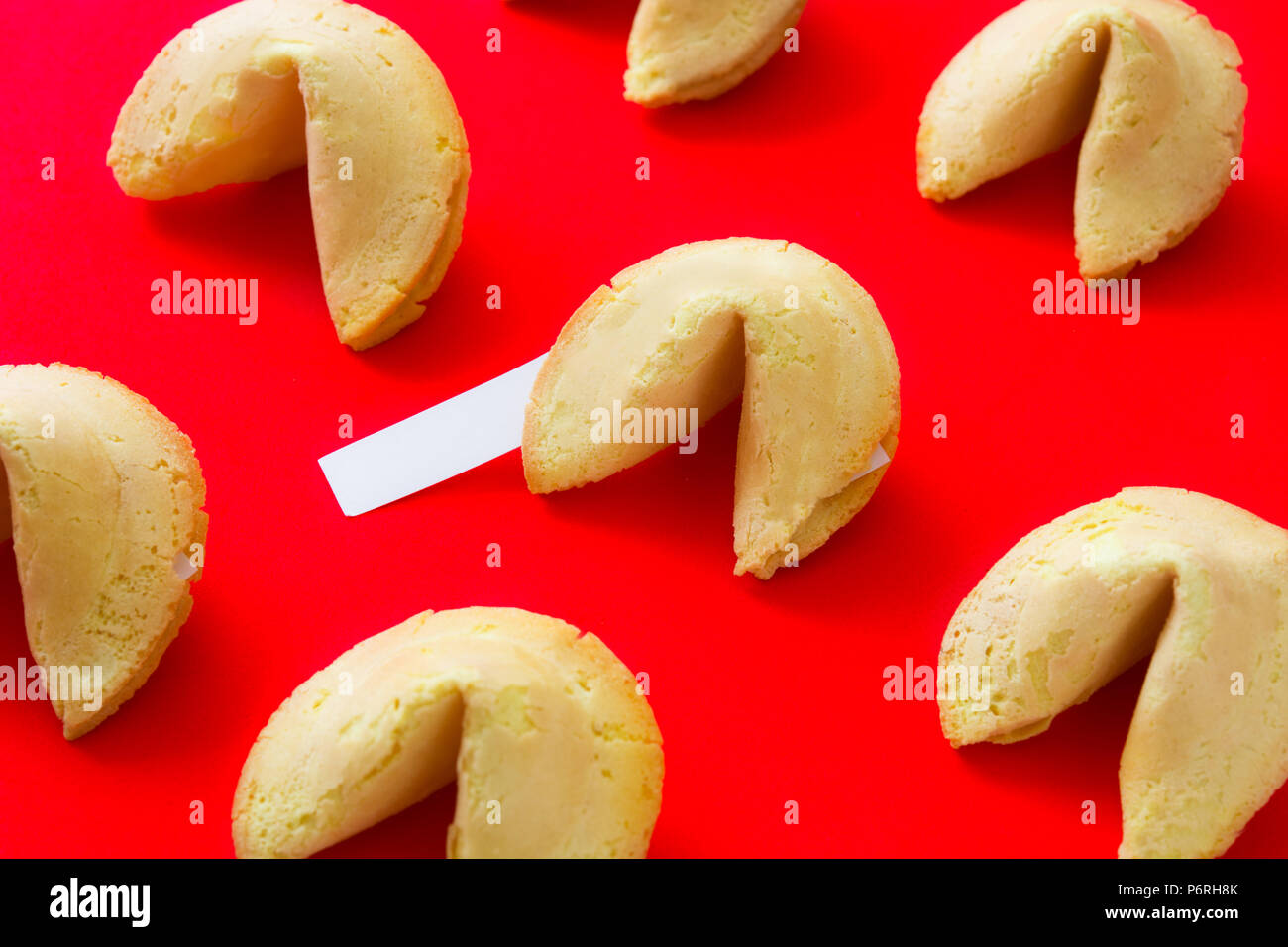Fortune cookies pattern on red background Stock Photo