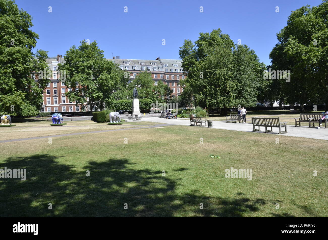 Elephant sculptures in Grosvenor Square, Mayfair London as part of the 2018 Elephant parade to highlight the plight of Asian elephants Stock Photo