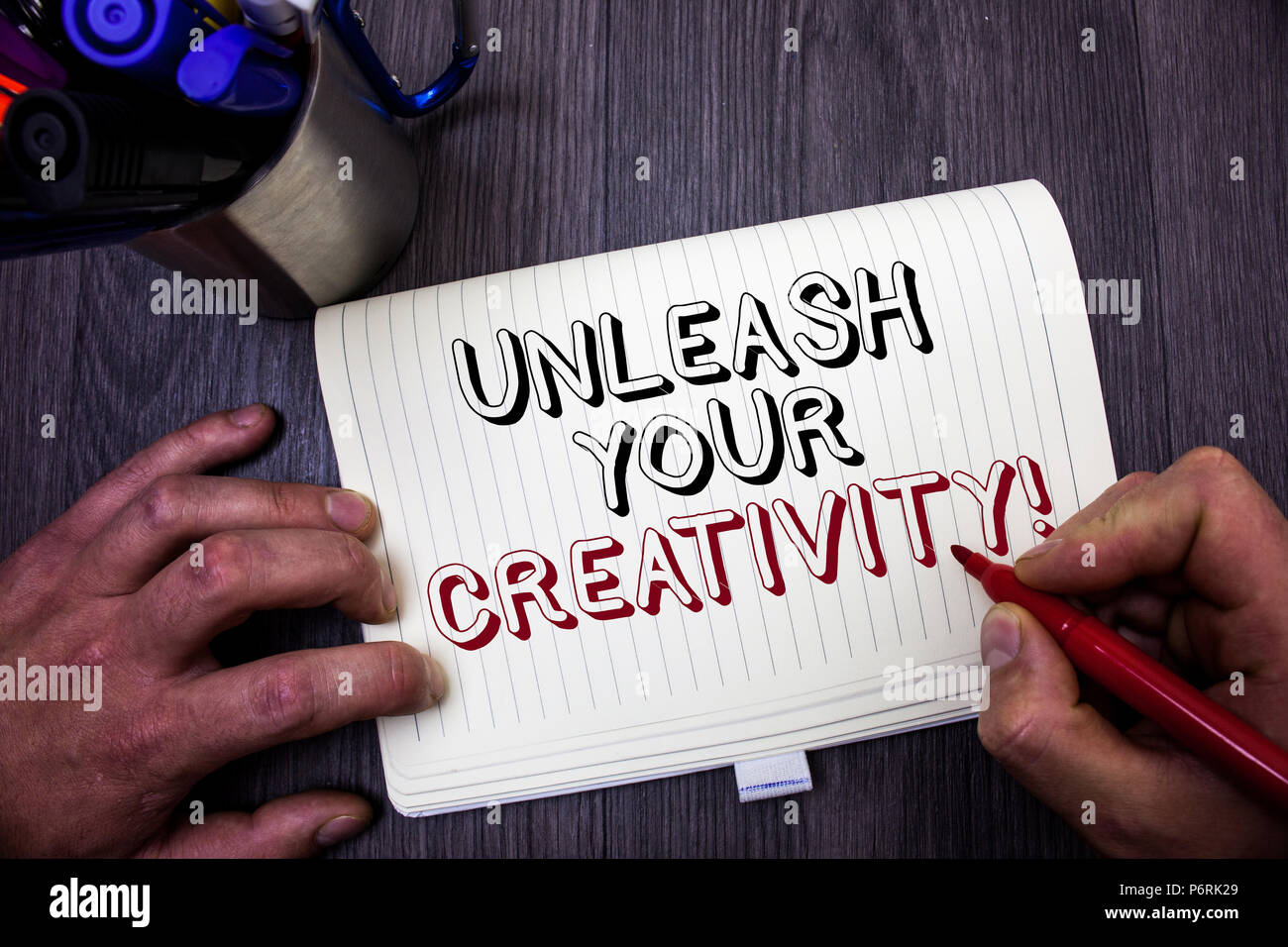 Conceptual hand writing showing Unleash Your Creativity Call. Business photo showcasing Develop Personal Intelligence Wittiness Wisdom Man hold holdin Stock Photo