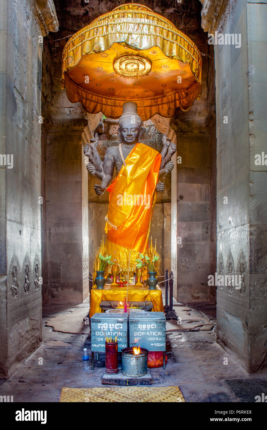 Eight-armed statue of the Hindu God Shiva inside Angkor Wat, Siem Reap, Cambodia. Stock Photo