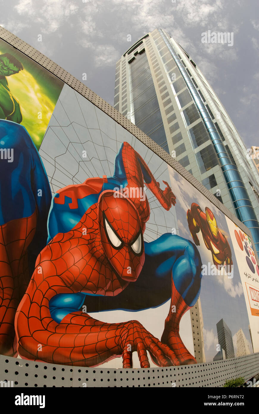Giant Super-Hero poster with superhero looking down to stree level Stock Photo
