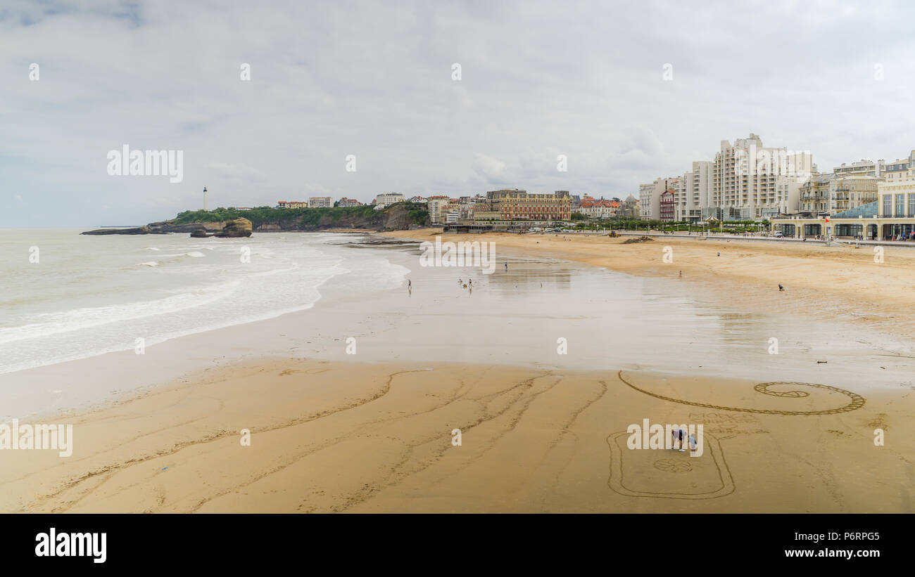 Grande Plage beach and rock on foreground, Biarritz, Aquitaine, France Stock Photo