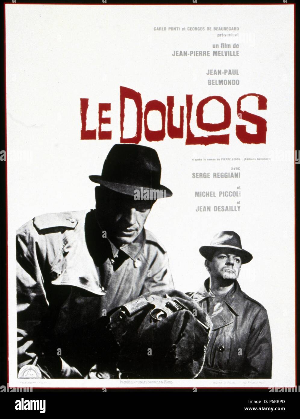 Le Doulos Year : 1962 - France Director : Jean-Pierre Melville Jean-Paul Belmondo, Serge Reggiani Poster (Fr)  Rome Paris Films/CCC Stock Photo