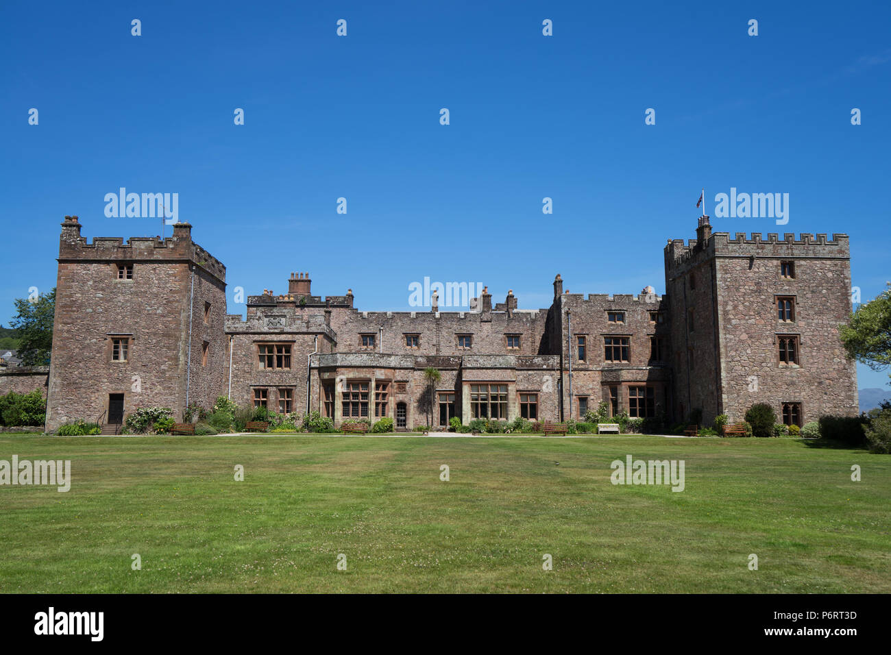 Muncaster Castle in the English Lake District on a clear blue sky day Stock Photo