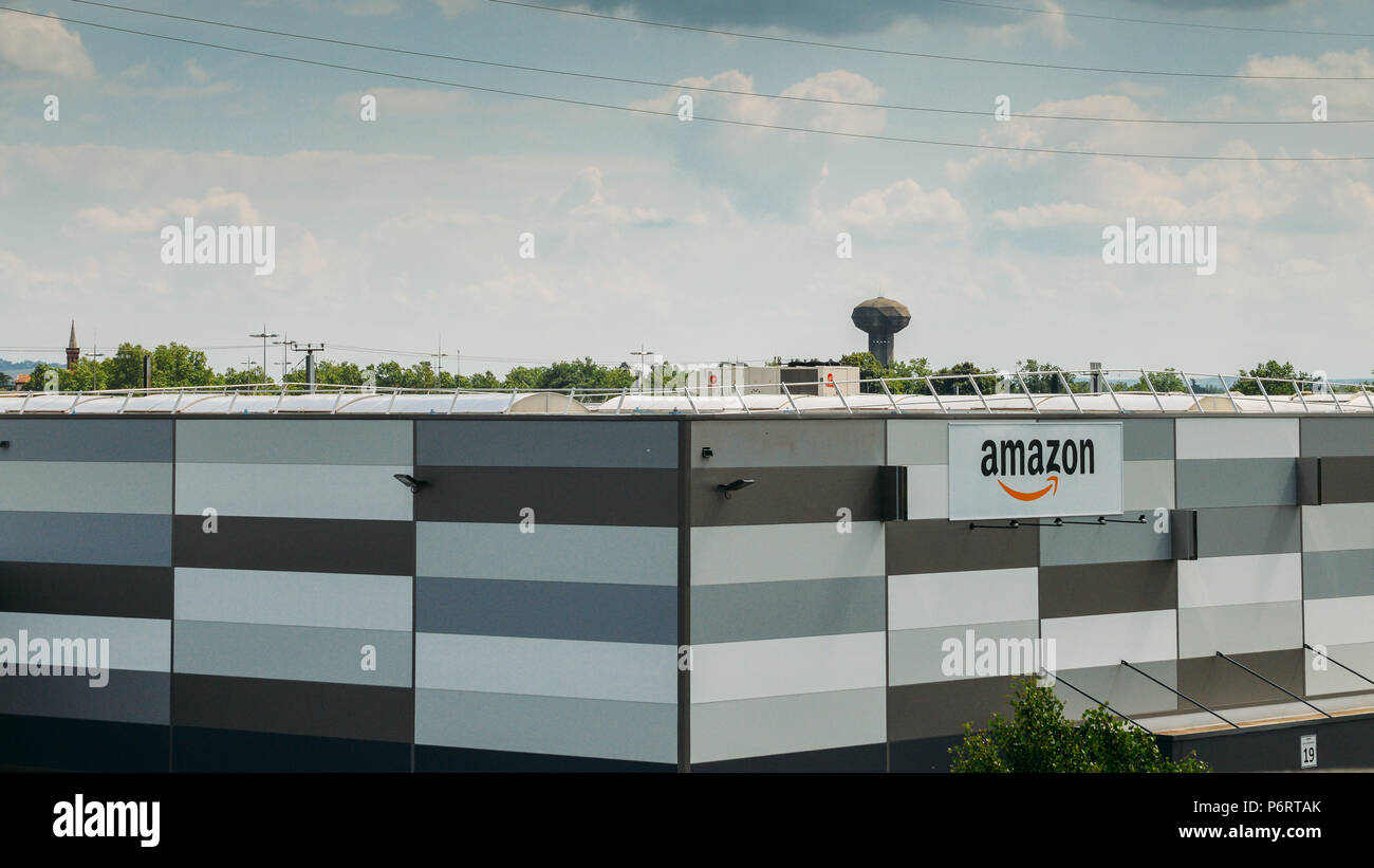 Facade of Amazon warehouse at Logistics distribution centre Stock Photo