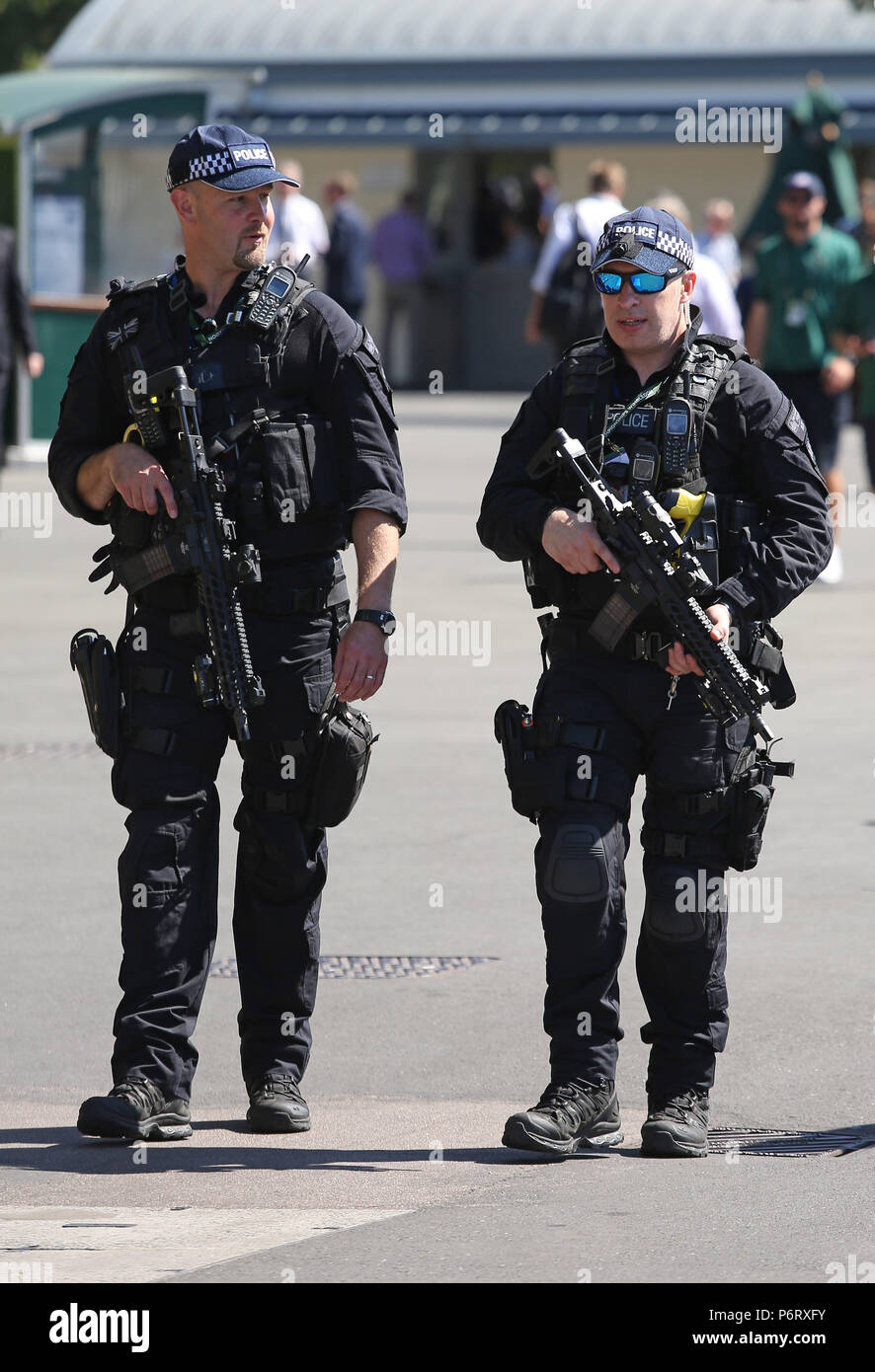 Armed police patrol the grounds on day one of the Wimbledon Championships  at the All England Lawn Tennis and Croquet Club, Wimbledon Stock Photo -  Alamy