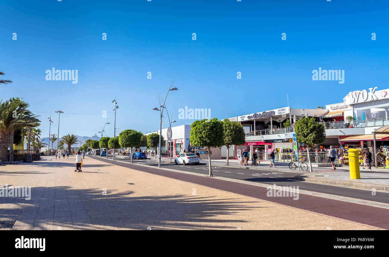 Puerto del Carmen, Spain - December 29, 2016: Avenida de las Playas street  view with tourists in Puerto del Carmen, Spain. Avenida de las Playas is 7  Stock Photo - Alamy