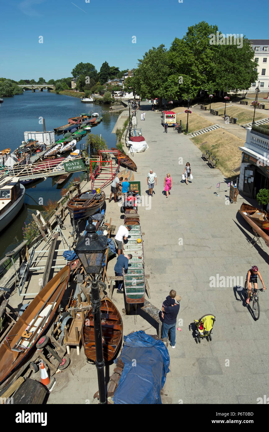summer activity on the riverside at richmond upon thames, surrey