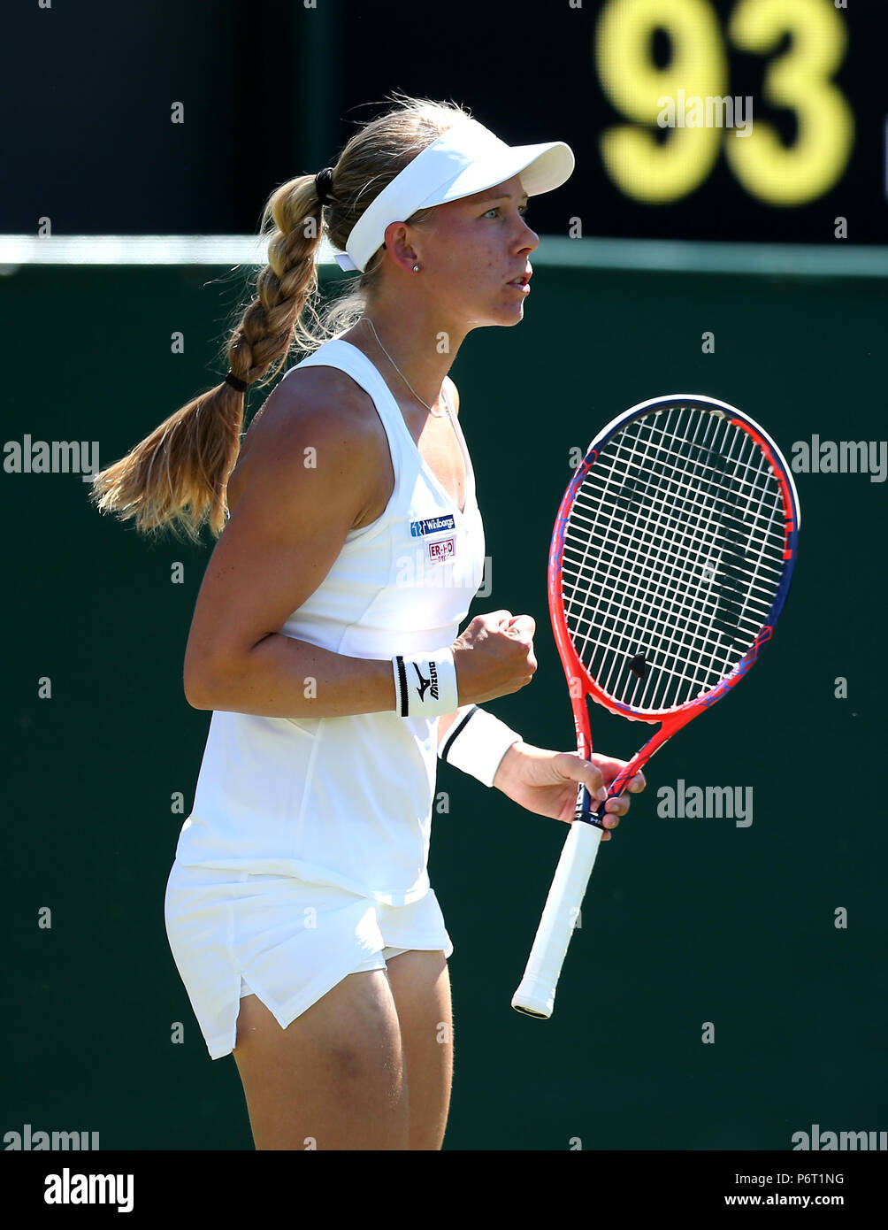 Johanna Larsson reacts on day One of the Wimbledon Championships at the
