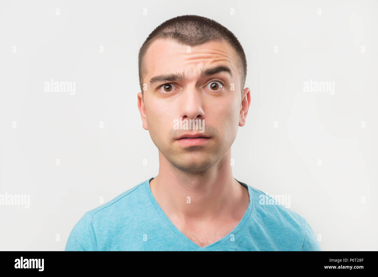 Doubtful italian man looking with disbelief expression . Stock Photo
