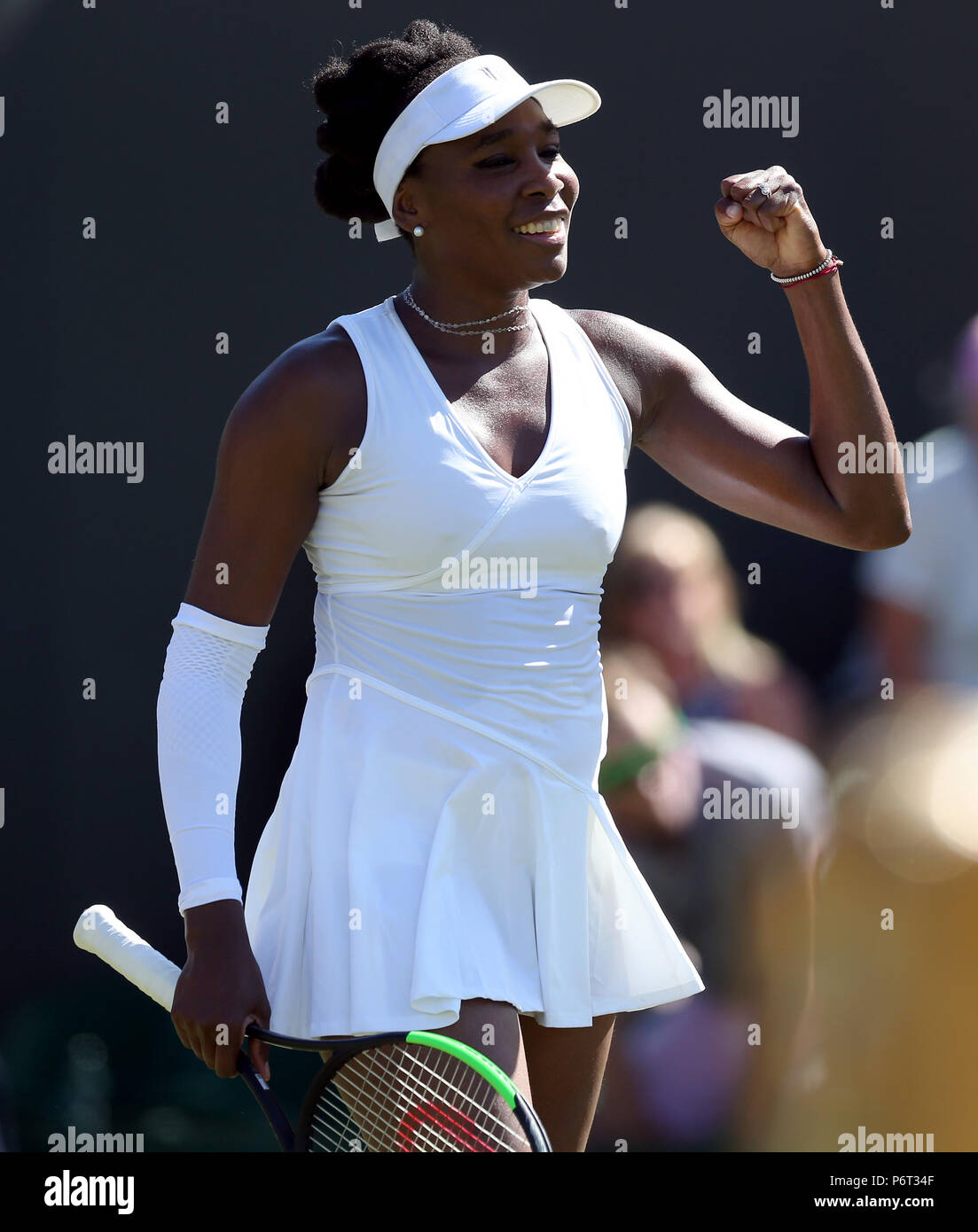 Venus Williams celebrates beating Johanna Larsson on day One of the