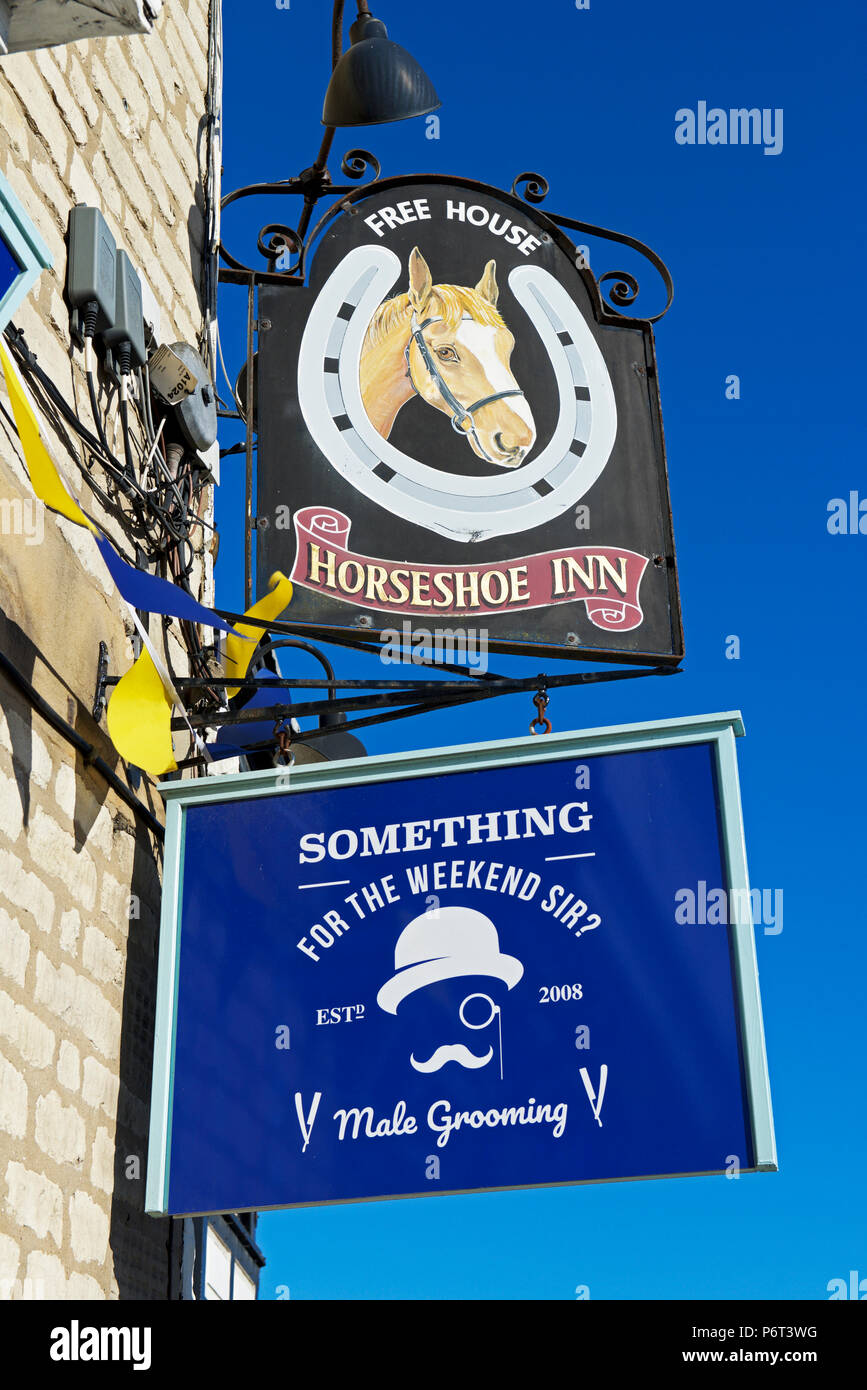 Sign for the Horshoe Inn and barber shop, Pickering, North Yorkshire, England UK Stock Photo