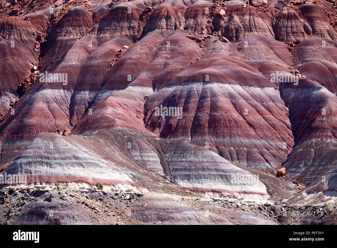 Horizontal white, red and purple sedimentary layersat Paria, a former movie set for westerns Stock Photo
