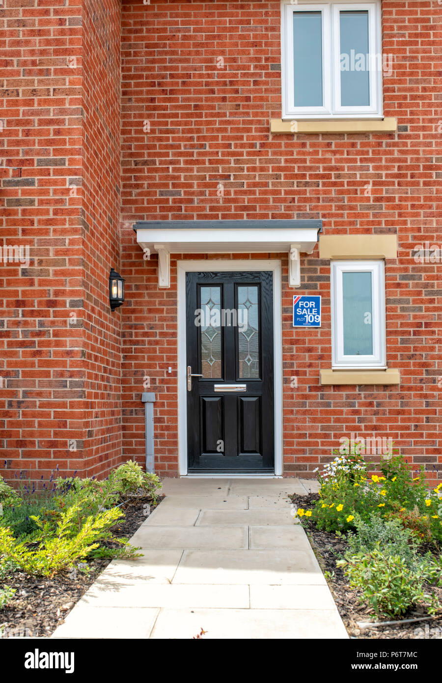 Close Up Of The Front Door Of A Newly Built House Stock Photo
