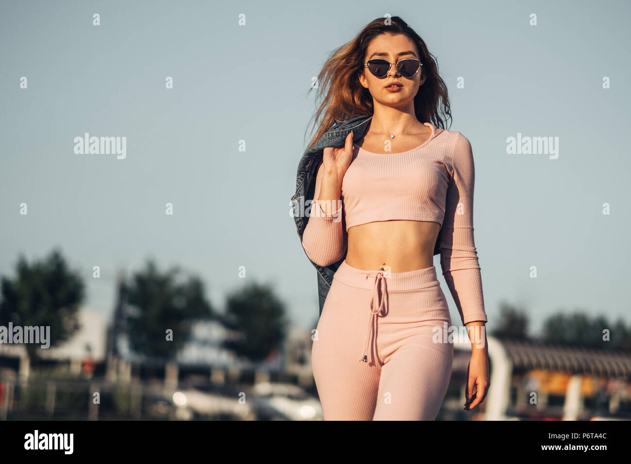 Portrait of Young and Beautiful Woman in Casual Clothes in the