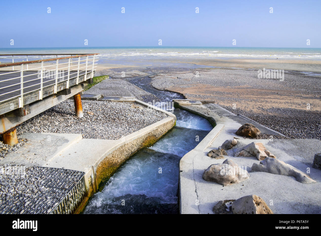 Outfall on beach / river mouth of the Veules, France's shortest sea-bound river at Veules-les-Roses, Seine-Maritime, Côte d'Albâtre, Normandy Stock Photo